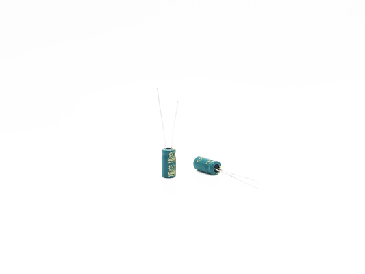 خازن الکترولیتی شعاعی 6.3x12mm 4.7UF 250V ESR پایین 5000 ساعت عمر بار